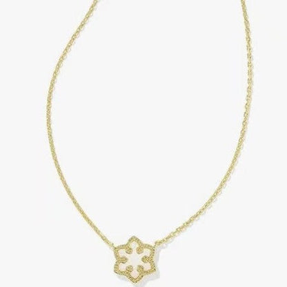 Gold-plated necklace with small snowflake charm pendant on gold chain
