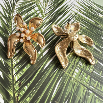 Floral enamel earrings with gold petal shapes and pearl bead details