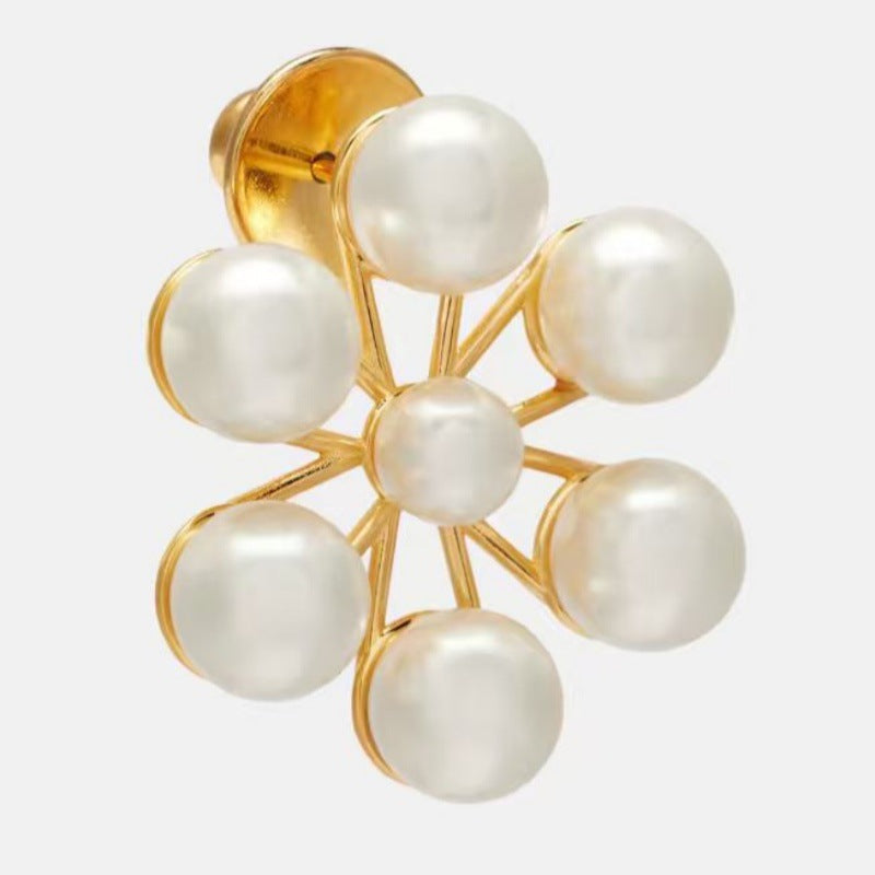 Gold-tone pearl starburst earrings with seven round pearl drops per flower
