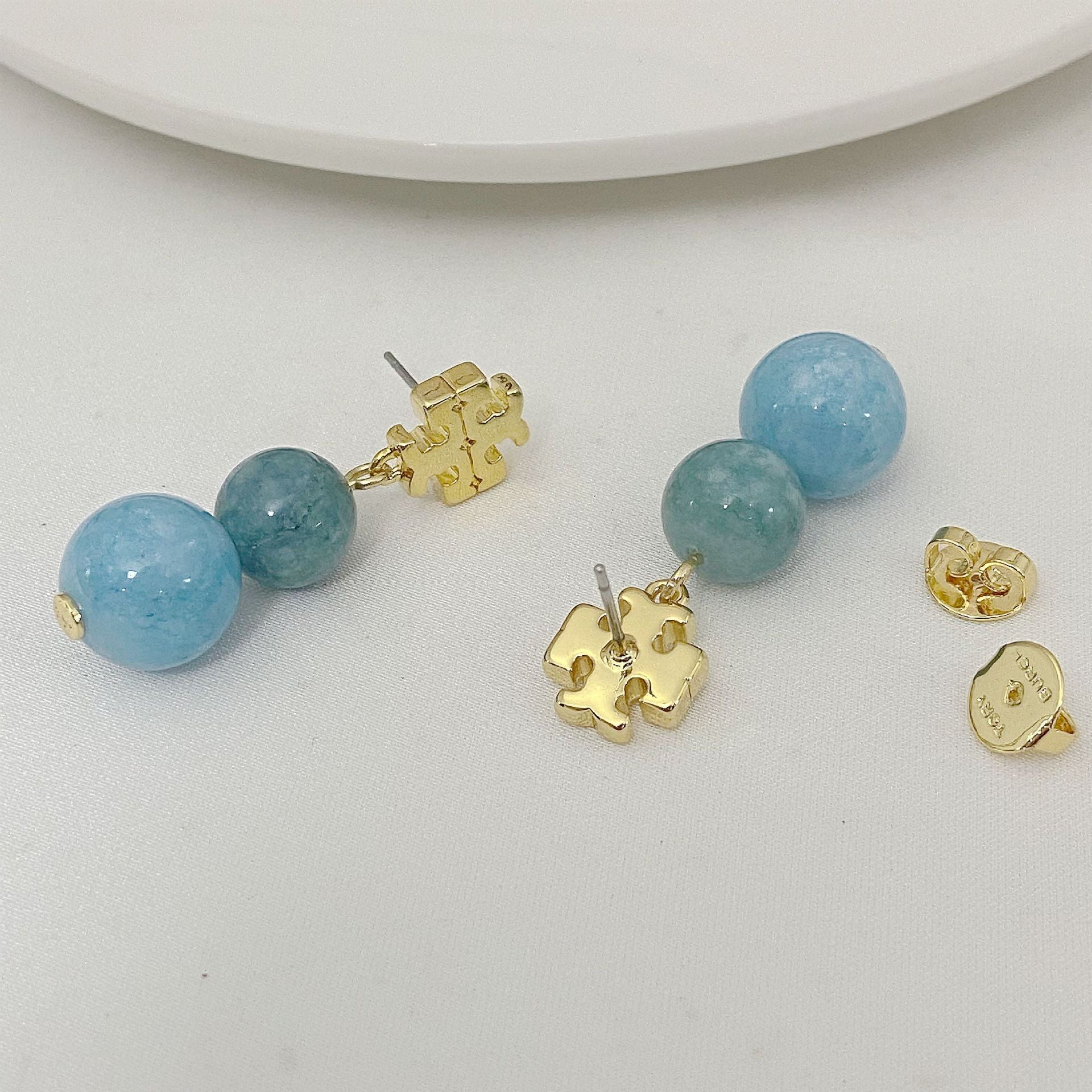 Tory Burch logo pendant earrings with blue agate beads and gold logo drops