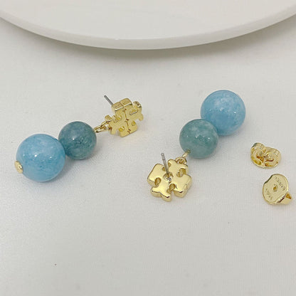 Tory Burch logo pendant earrings with blue agate beads and gold logo drops