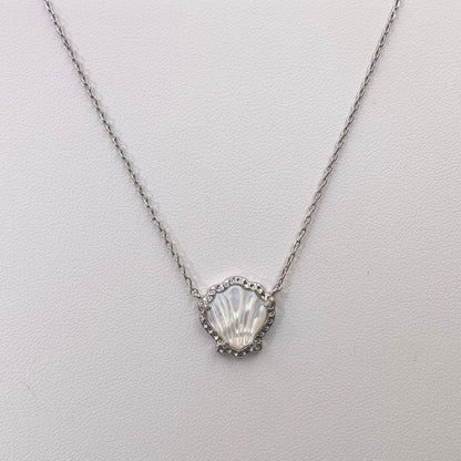 Silver-tone scallop pendant necklace with white mother-of-pearl shell center