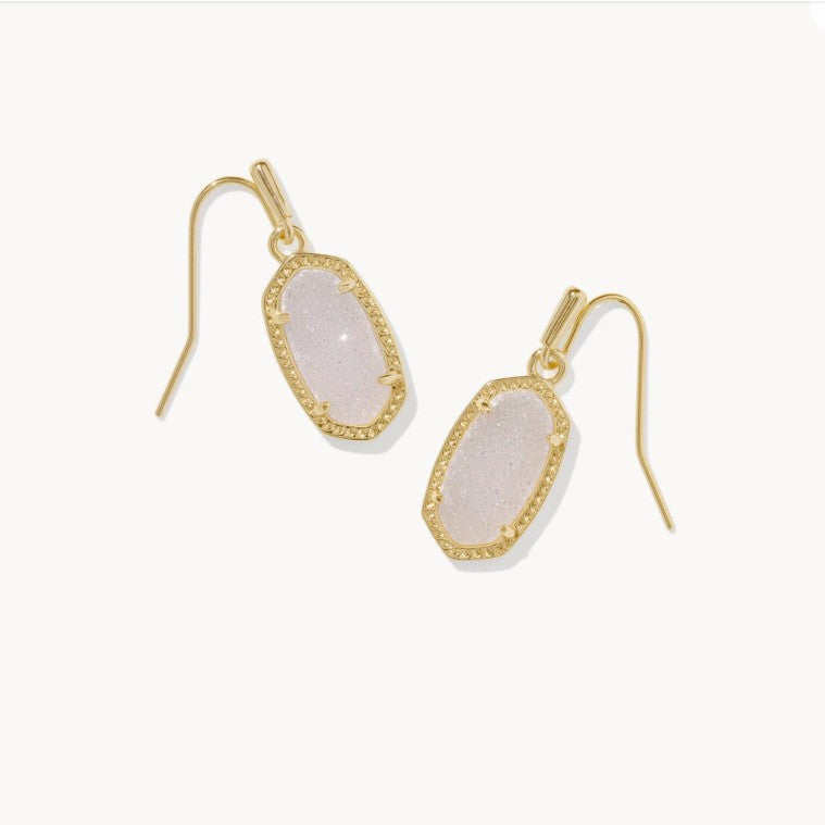 Gold-tone oval crystal drop earrings with hook backs and pale pink glitter stones