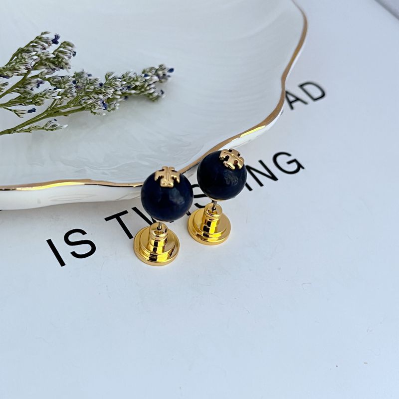 Deep blue round pearl geometric stud earrings with gold-tone posts and backs
