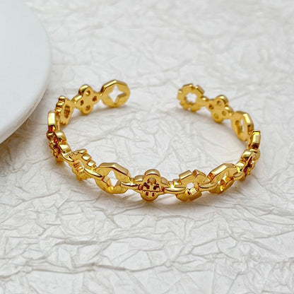 Tory Burch 18K Gold Plated Openwork Four-Leaf Clover Bangle