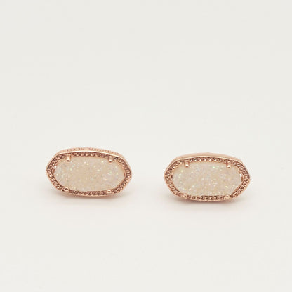 Kendra Scott oval gemstone stud earrings with sparkly light pink crystal in rose gold bezel