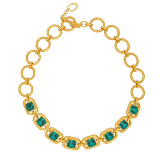 Gold-tone chain necklace with oval emerald faceted crystals