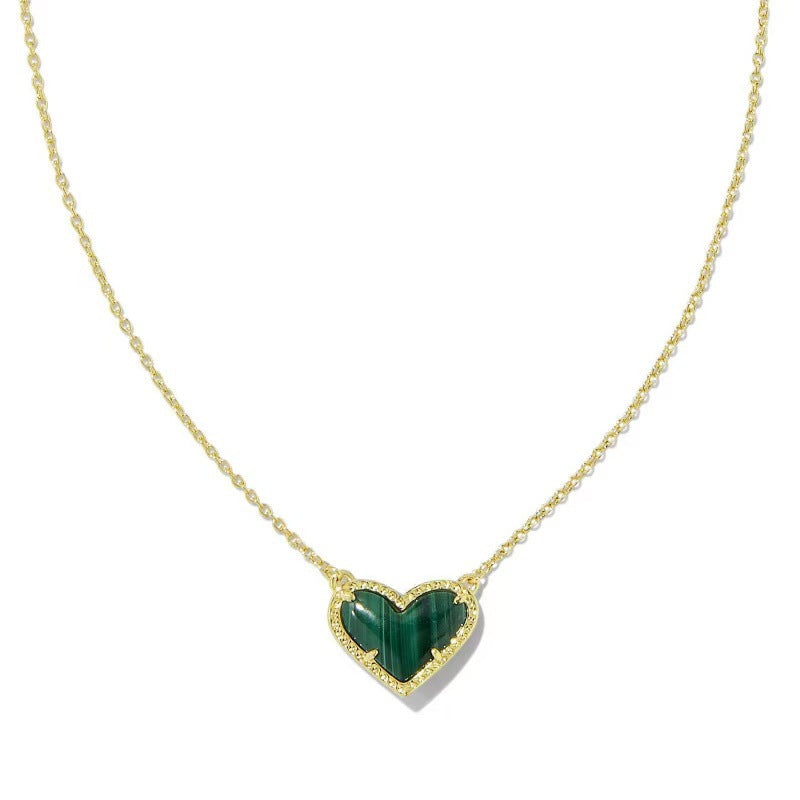 Heart pendant necklace with dark green heart and gold-tone chain