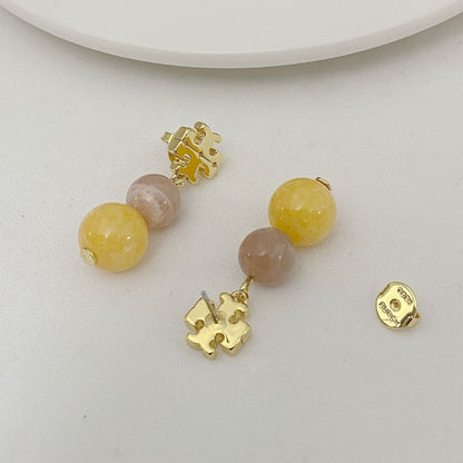 Tory Burch logo pendant earrings with yellow and pale pink agate beads