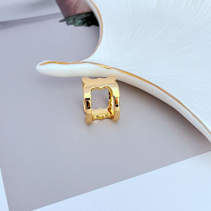 Tory Burch Unique Wide Polished Metal Ring women
