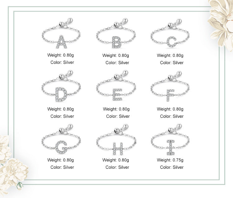 Set of pavé initial letter bracelets in sterling silver, shown with letters A–I