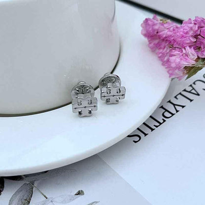 Tory Burch minimalist, shiny logo metal stud earrings - JIMMY JEWELRY 01