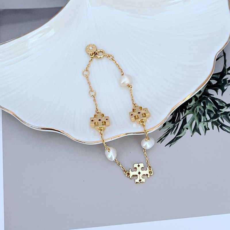 Tory Burch Elegant Natural Pearl Metal Bracelet for Women