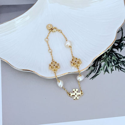 Tory Burch Elegant Natural Pearl Metal Bracelet for Women