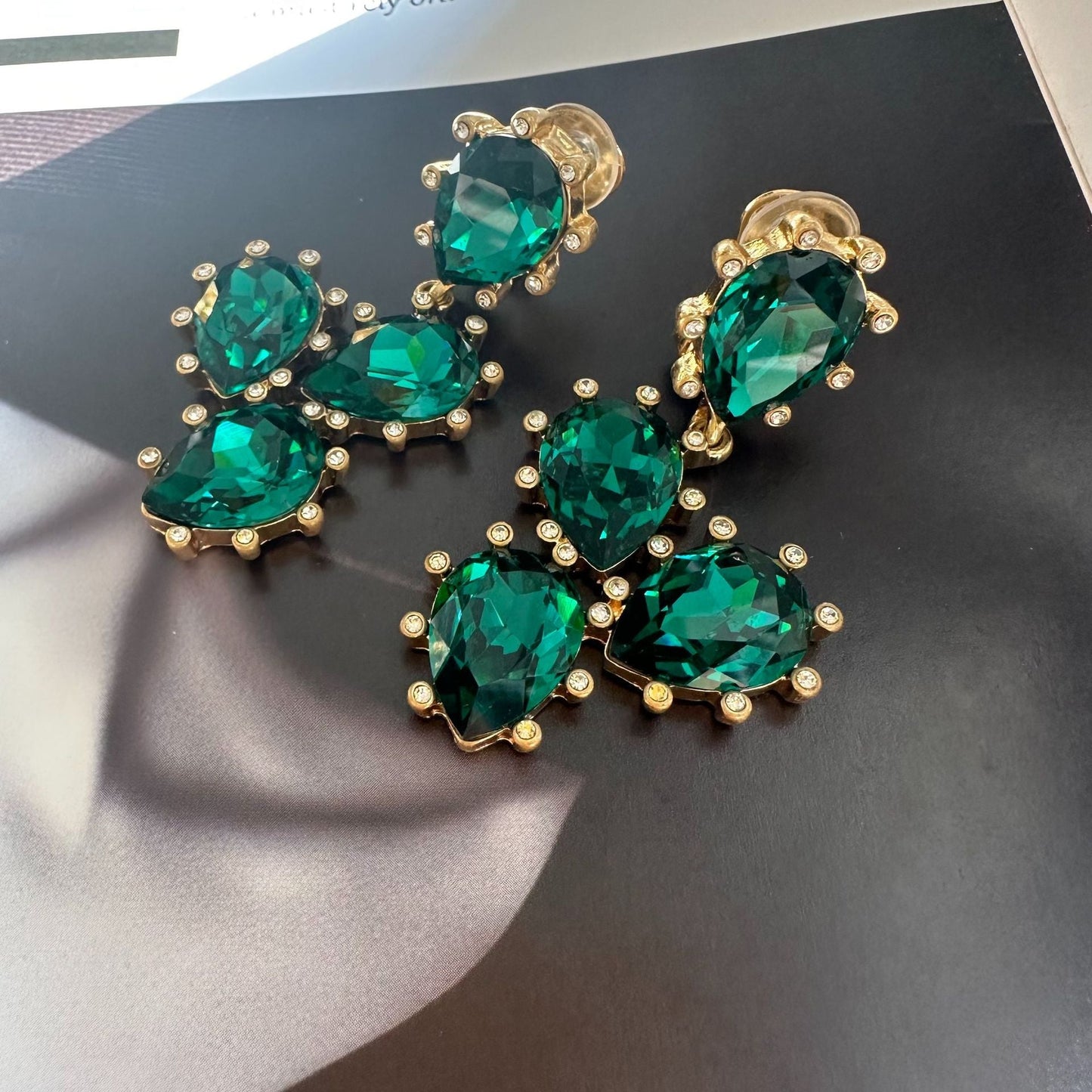Cactus-cut glass ear clips with emerald-green stones and gold-tone setting