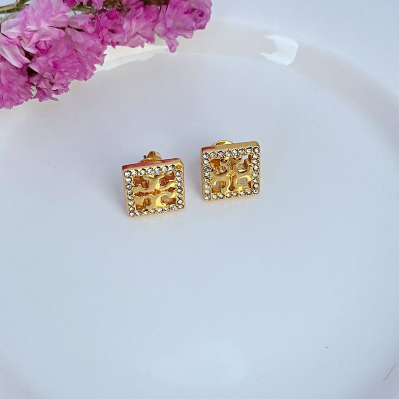 Gold-tone square rhinestone openwork stud earrings with ornate cutout center