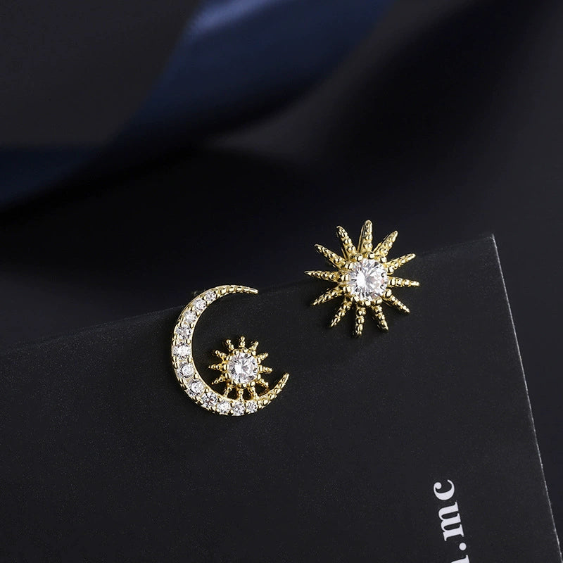 Crescent moon and star diamond earrings in gold tone with pavé sparkle