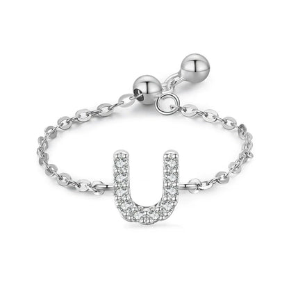 Pavé initial letter bracelet with an “U” charm set in sterling silver
