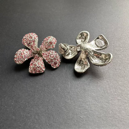 Pink rhinestone flower earrings with stud backing, silver-tone hardware