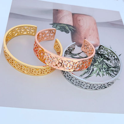 Tory Burch Fashionable Openwork Logo Metal Bangle
