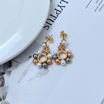 Tory Burch gold-tone round hoop centerpiece pearl dangle earrings with crystal charm