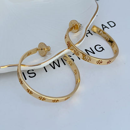 Tory Burch Elegant Cutout Logo Metal Large Earrings