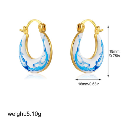 Small gold hoop earrings with blue marbled teardrop inlay, 19mm