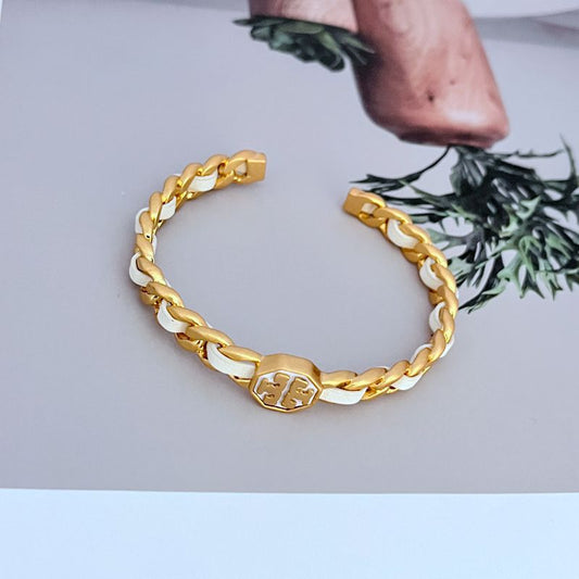 Woven leather logo open cuff bangle with gold and white link design
