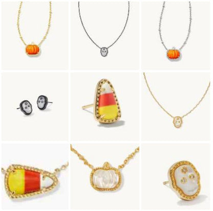 Assorted pumpkin and skull necklace charms shown on a jewelry display grid