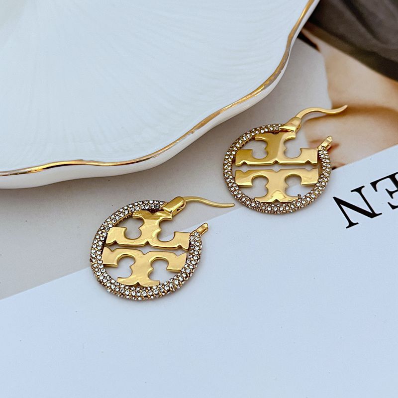 Tory Burch rhinestone openwork metal hoop earrings, gold-tone, cutouts with textured border