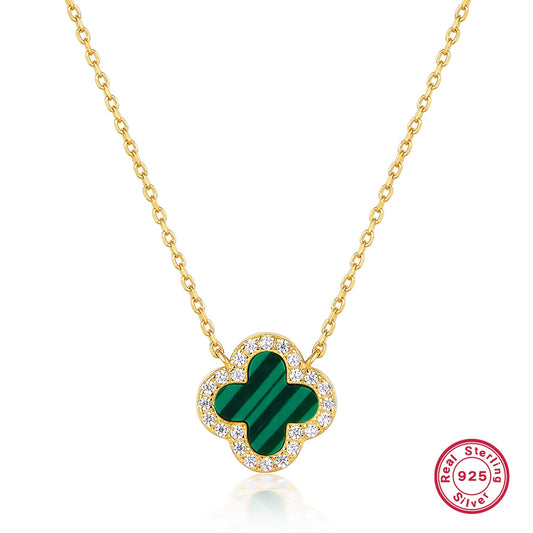 Gold four-leaf clover pendant necklace with green malachite center and white crystal border