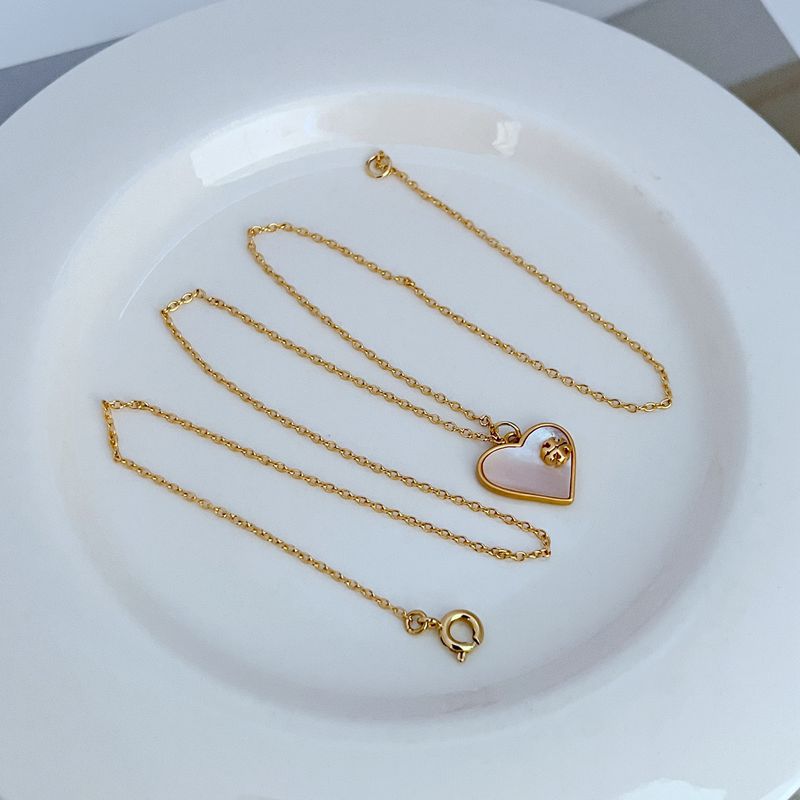 Tory Burch Heart-Shaped Shell Pendant Metal Necklace