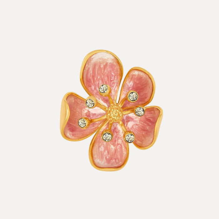 Pink enamel cherry blossom metal brooch with gold-tone petals and small rhinestones