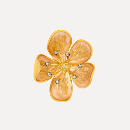 Pale yellow enamel cherry blossom metal brooch with gold-tone petals and rhinestones