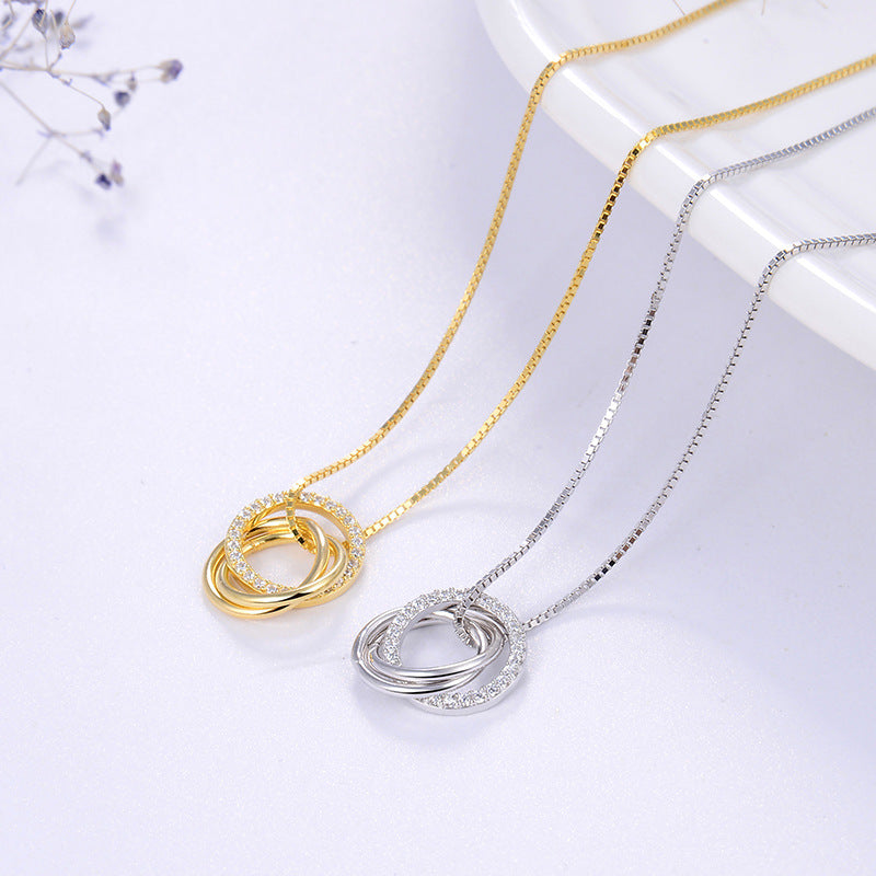 triple linked ring pendant