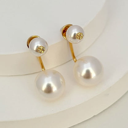 Gold-tone pearl drop earrings with large and small white pearls