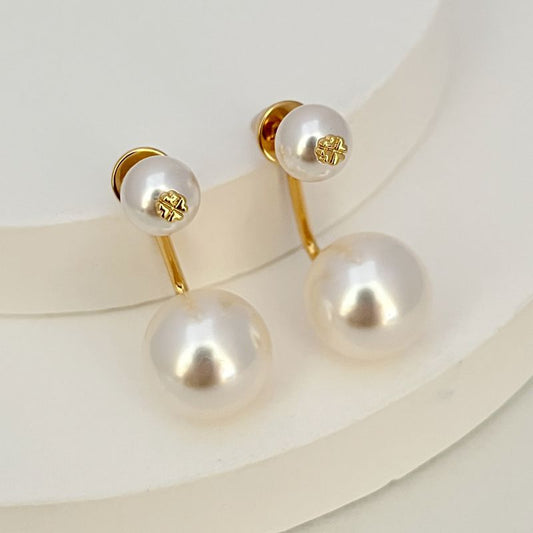 Gold-tone pearl drop earrings with large and small white pearls