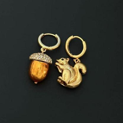 Gold squirrel and pine cone earrings