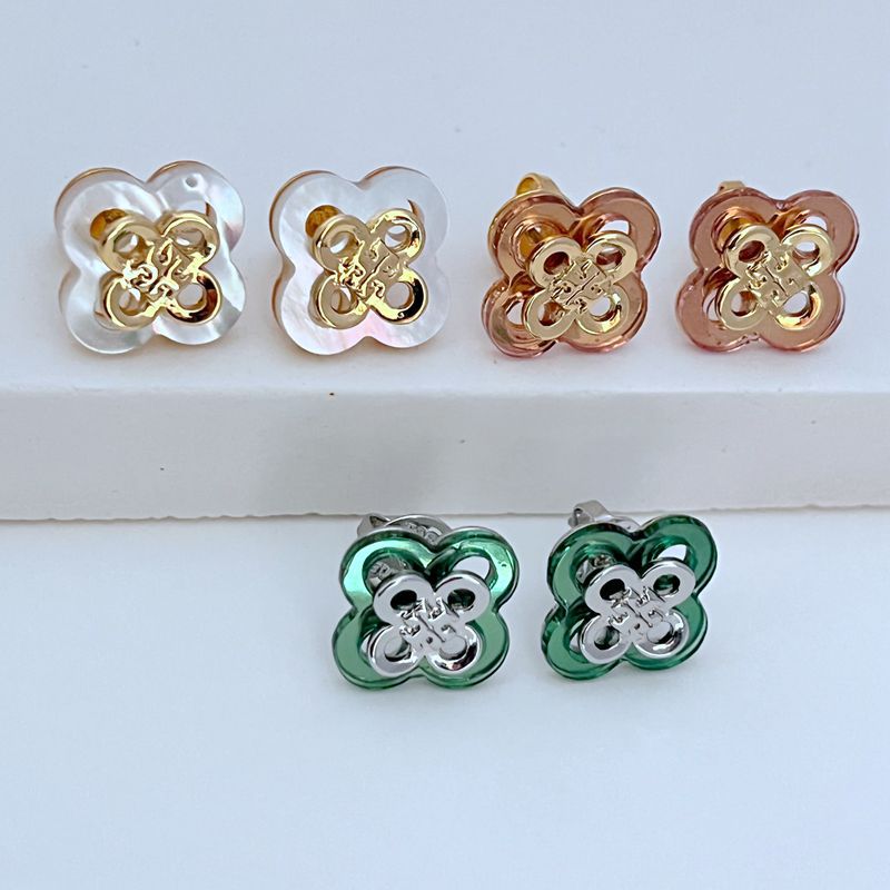 Clover flower stud earrings in white, pink, rose gold and green, gold-tone details