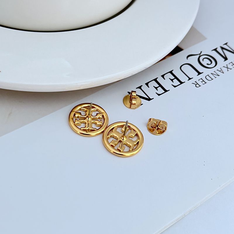 Gold round logo metal stud earrings with post backs shown, openwork pattern