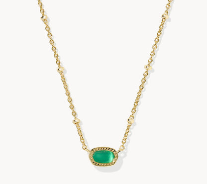 Gold-tone necklace with oval green gemstone pendant on a fine chain.