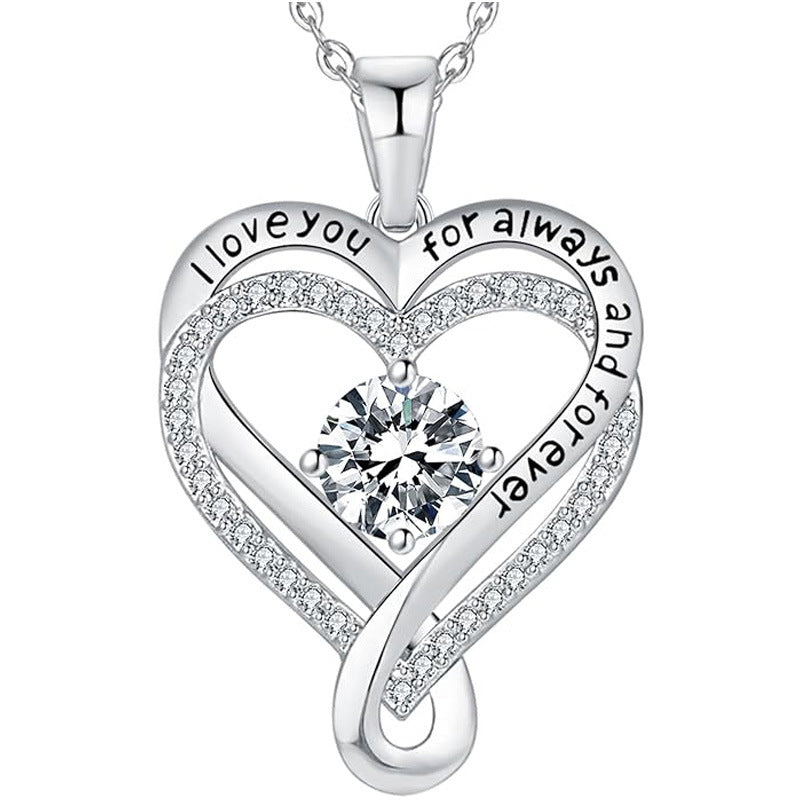 Silver heart pendant necklace with clear round diamond-like gemstone and pave details