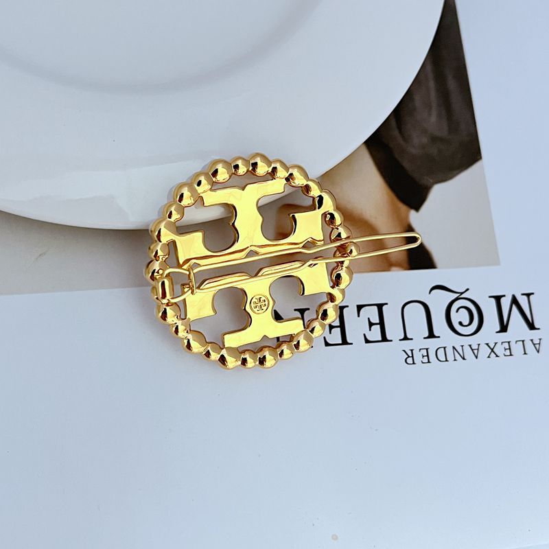 Tory Burch Pearl Openwork Circular Logo Exquisite Metal Hair Clip