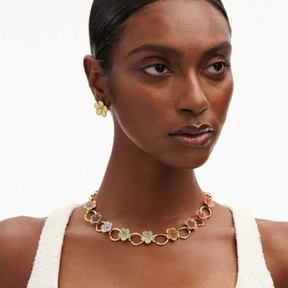 Floral pendant necklace on gold chain with multicolor rhinestone clover charms