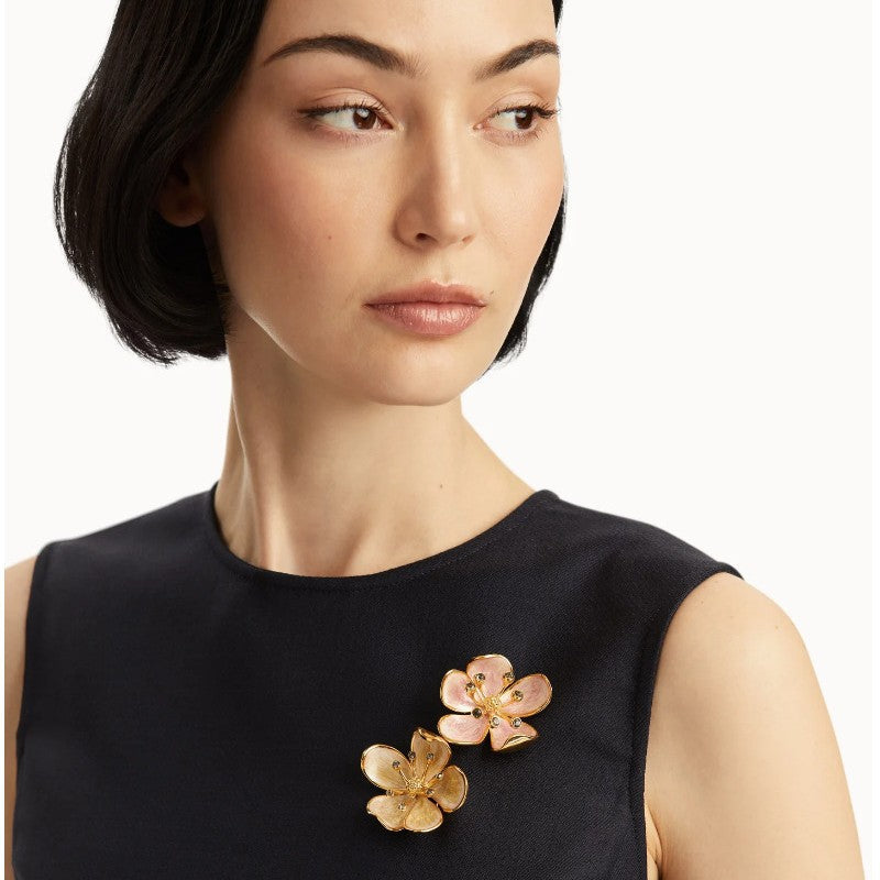 Gold-tone cherry blossom enamel brooch with pale pink petals and rhinestone accents