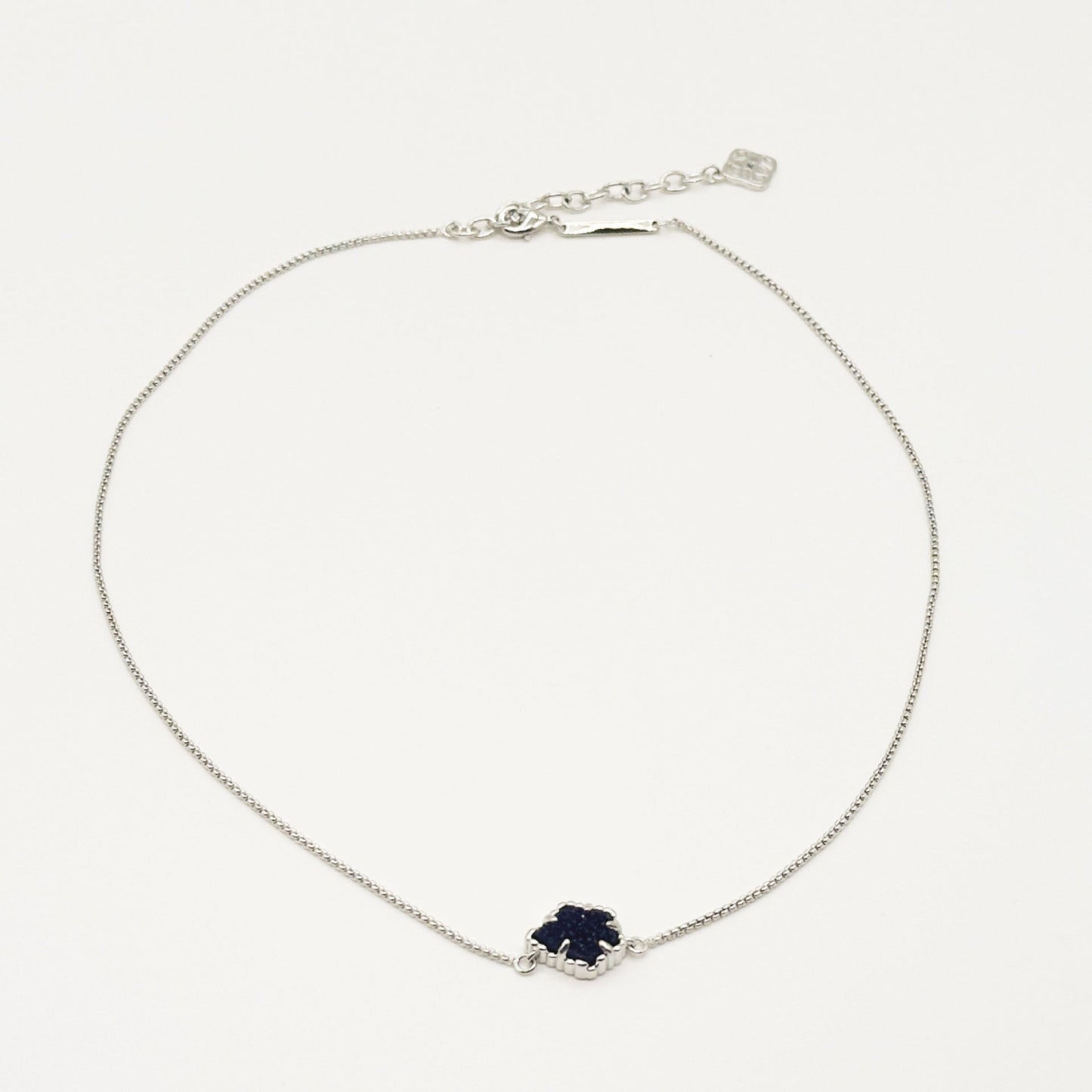 Kendra Scott silver-tone mother-of-pearl necklace with dark navy rhombus pendant