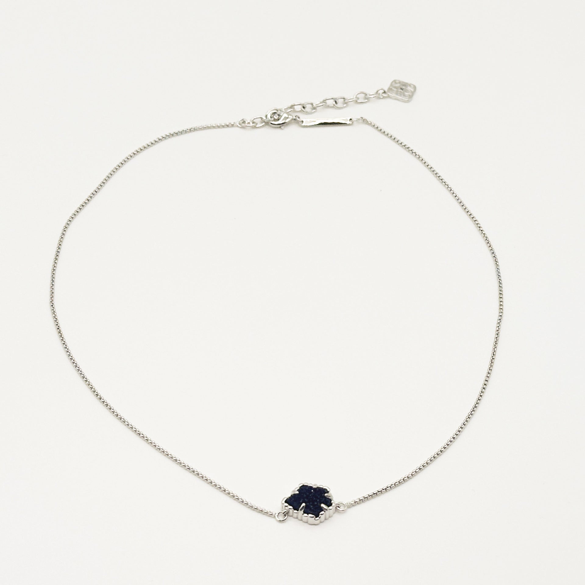Kendra Scott silver-tone mother-of-pearl necklace with dark navy rhombus pendant