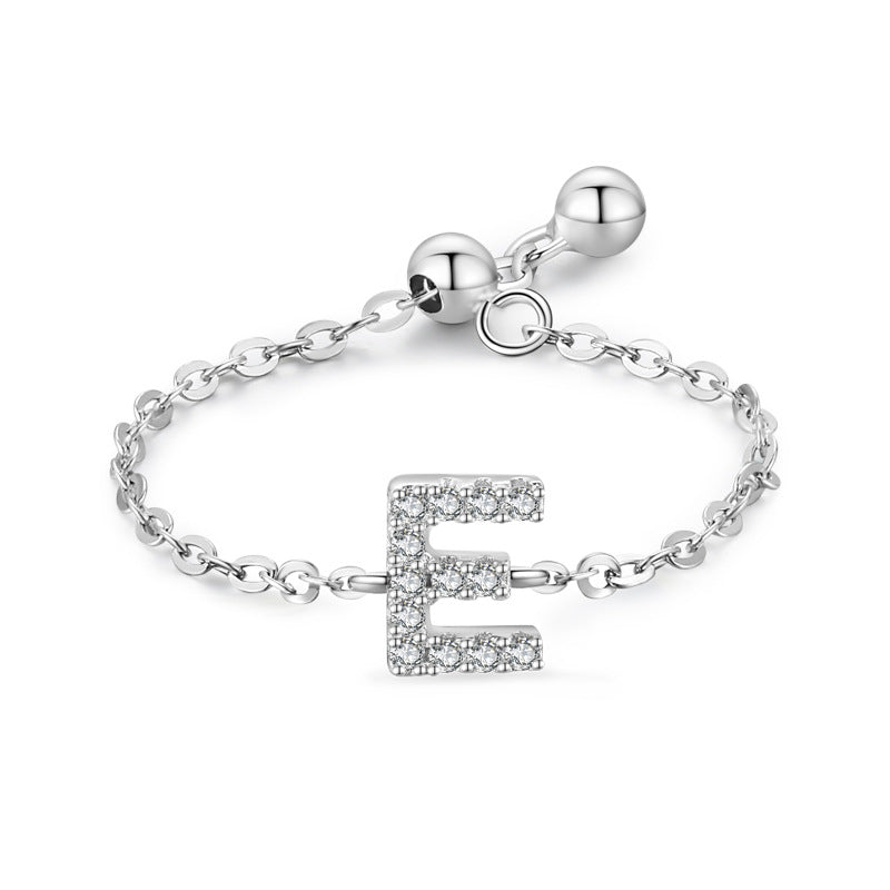 Sterling silver pavé initial bracelet with letter E charm and link chain clasp