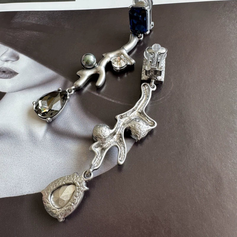 Silver-tone coral branch clip-on earring with blue square stone, crystal teardrops, green pearls