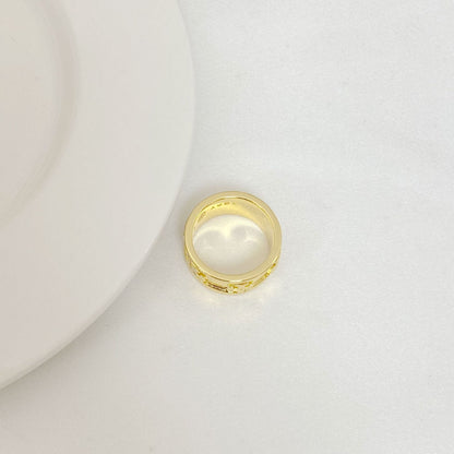 Tory Burch Elegant Polished Metal Logo Ring Women